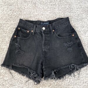 Black and distressed, high rise cut off jeans shorts button fly